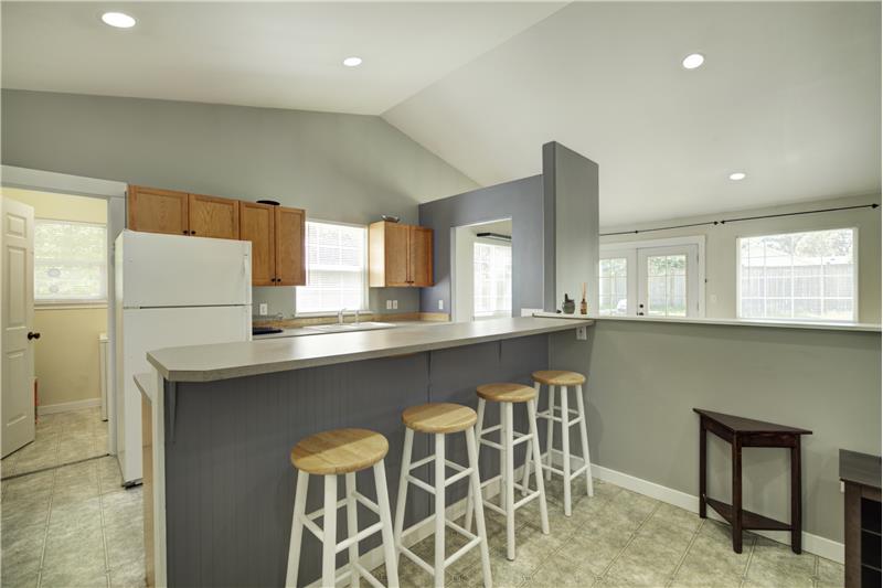 Kitchen bar eating space, and table area