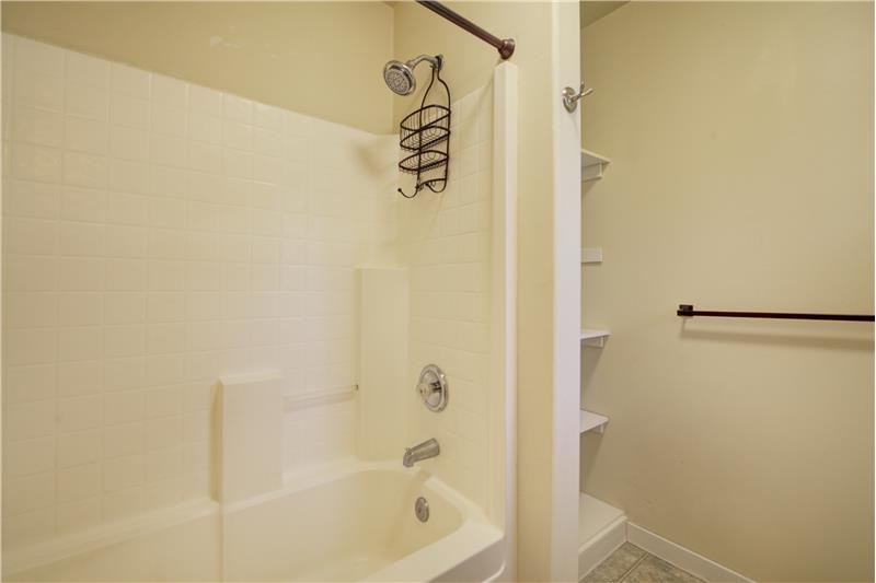 Primary bath shower/tub/with shelving