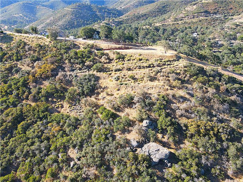 At 1.05 acres, the lower property line stops above those rocks!