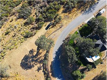 There is a General Contractor building a custom home lower on Zurich Drive who would love to go crazy with this hilltop build!