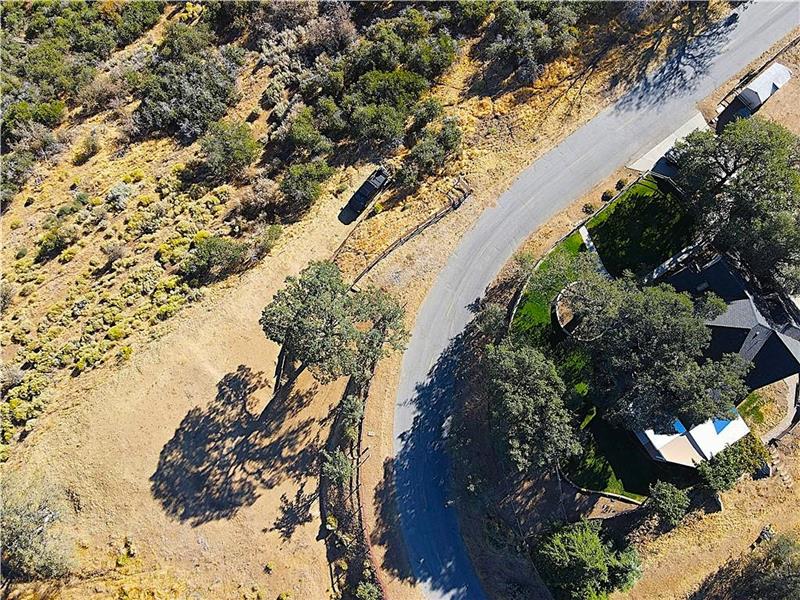 There is a General Contractor building a custom home lower on Zurich Drive who would love to go crazy with this hilltop build!