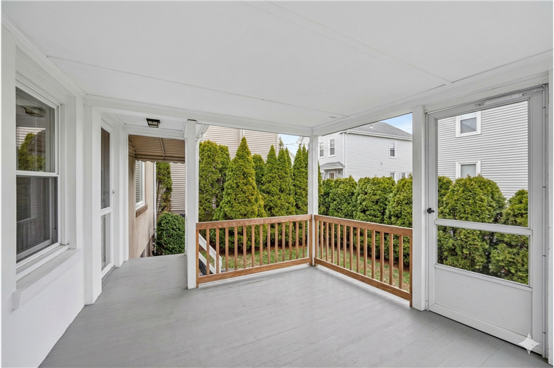 Step outside to your private oasisfeaturing a large deck, patios, and a level backyard ideal for entertaining