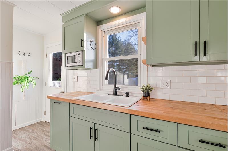 Butcher block countertops & Vintage cast iron sink