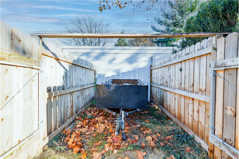 Trailer/trash can storage area