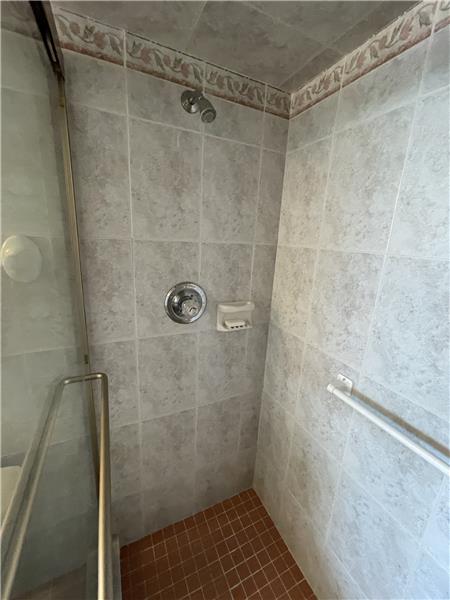 Tiled shower in Master