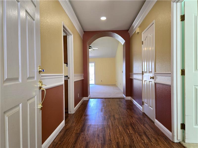 A clean, gallery style entry that sets the tone for contemporary living.