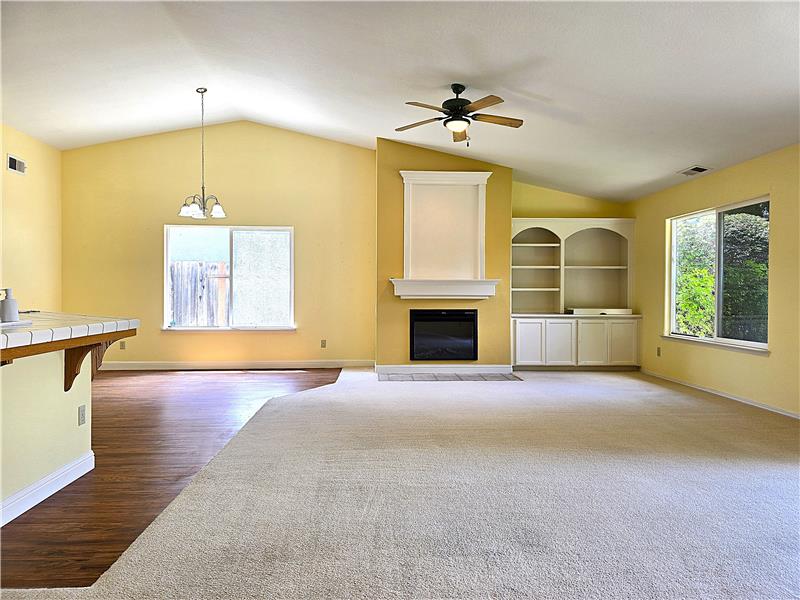 Expansive great room with natural light and a calm, modern aesthetic.