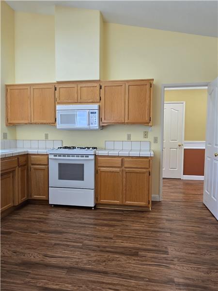 An additional kitchen doorway creates a smart, functional flow throughout the home.