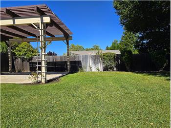 A versatile backyard with room to relax, entertain, and enjoy Templetons clear evening skies. We live in paradise!