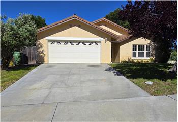 The expansive driveway offers exceptional convenience for guests, gatherings, and everyday parking needs alike.