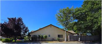 The expansive side frontage adds valuable convenience for households with multiple vehicles, guests, or recreational needs.