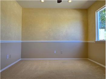Soft natural light of Bedroom 2 creates a calm, inviting atmosphere.