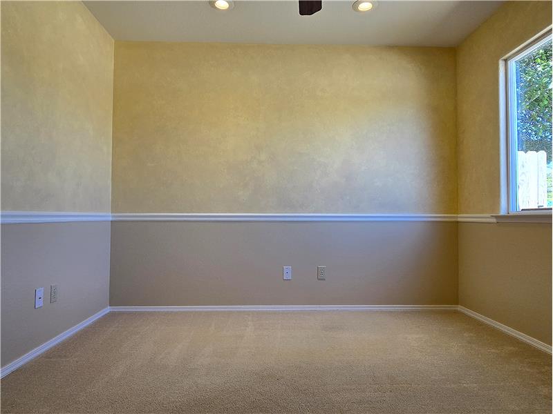Soft natural light of Bedroom 2 creates a calm, inviting atmosphere.