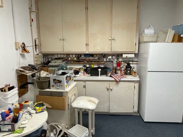 small half kitchen off Pool area