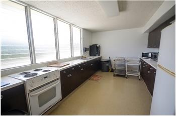 Kitchen in Community Penthouse