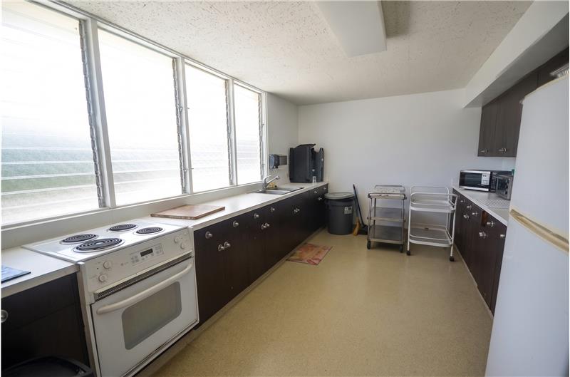 Kitchen in Community Penthouse