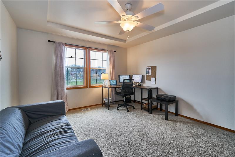 Upstairs Bonus Room/Office with Coffered Ceiling and Ceiling Fan.