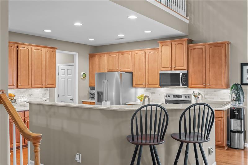 Open kitchen with breakfast bar