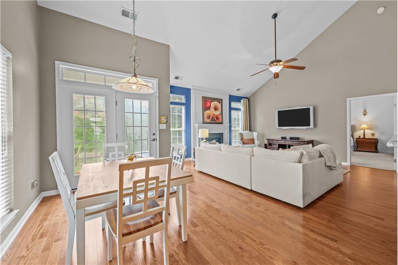 Vaulted ceilings and open sight lines between breakfast area and great room