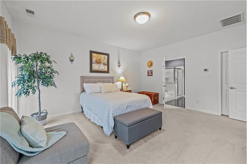 Space for king size bed, sitting area, larger dresser