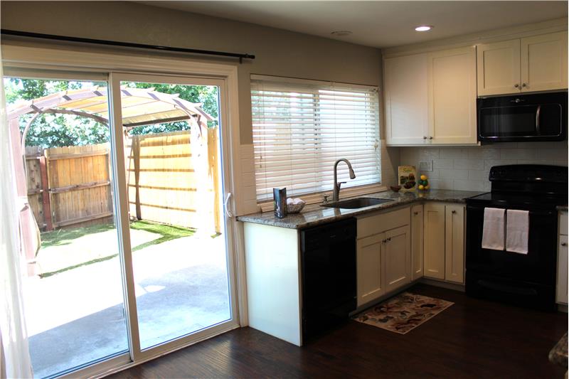 Kitchen Sliding Door Leads to Backyard