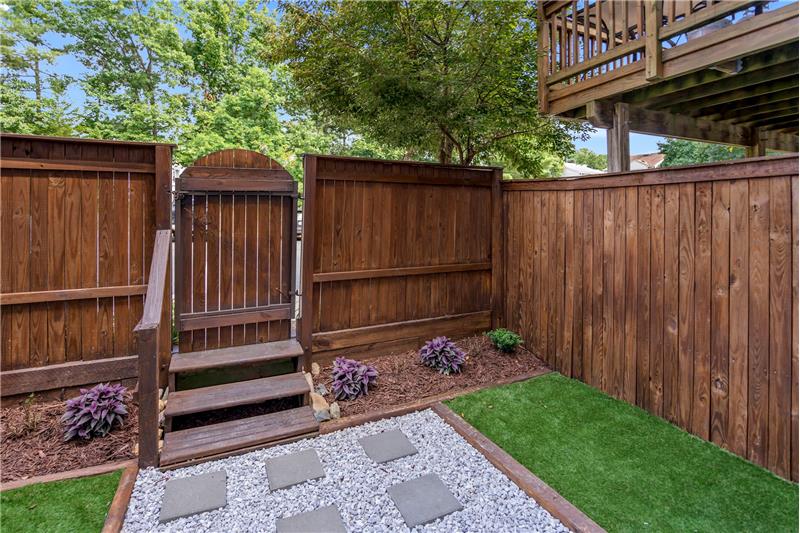 Fenced Back Yard with Built-In Drainage