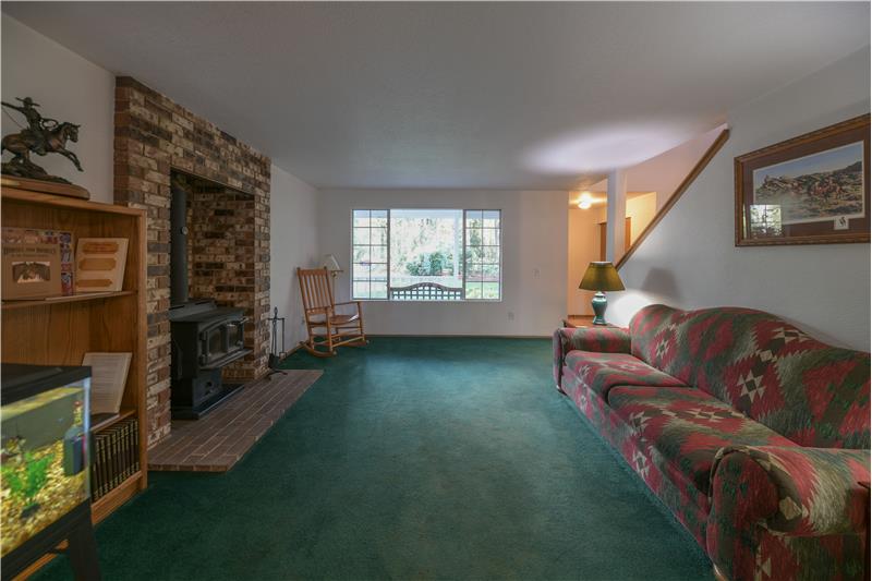 Living room. Wood stove keeps the house warm.