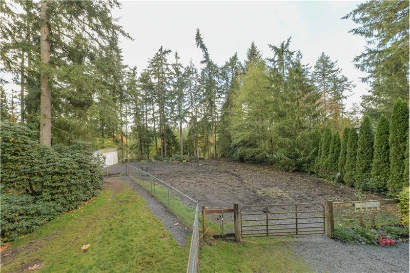 Horse pasture as seen from the upstairs back deck. Pasture goes down on the hillside.