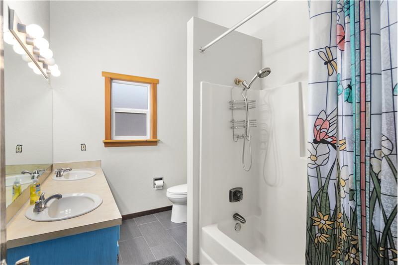 Full Bathroom on 2nd level, next to the bedrooms.