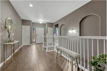 Beautiful front Entry with wood tile flooring.