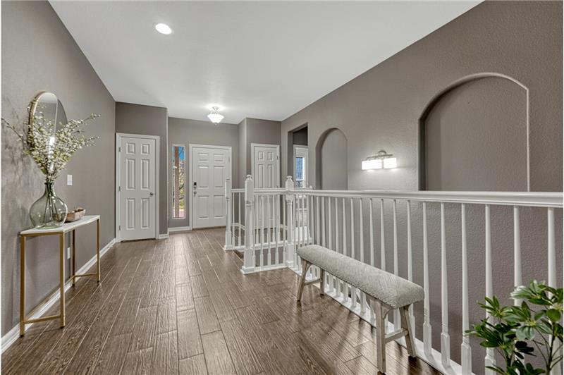 Beautiful front Entry with wood tile flooring.