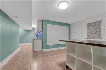 Basement Flex Room designed for many uses such as a craft room, play room, pantry, or study.