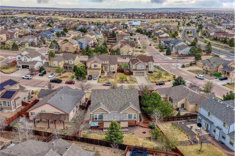 Aerial rear views of home and backyard.