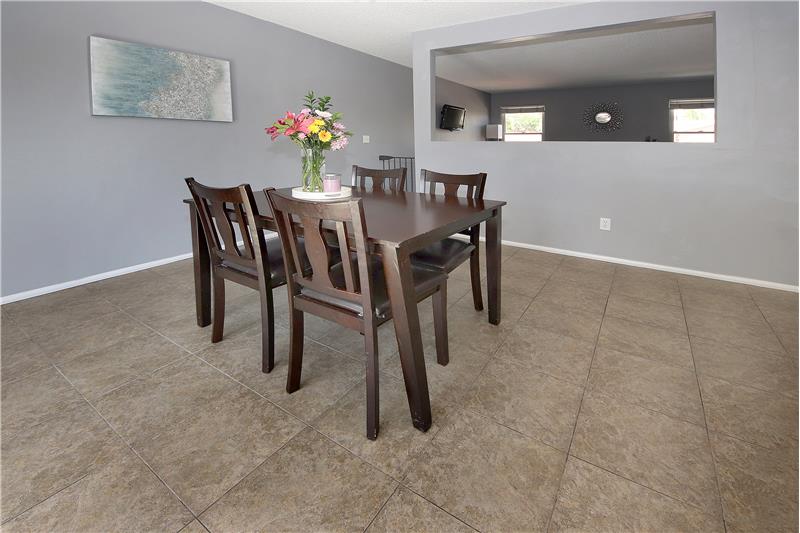 Dining area with tile flooring