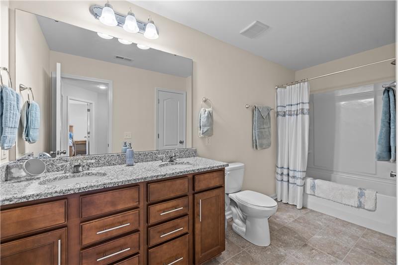 Second floor bathroom with double sink vanity