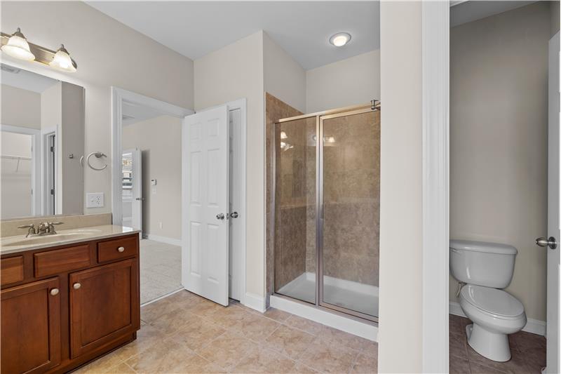 Separate, step-in shower with tile surround, private WC. Freshly painted throughout.