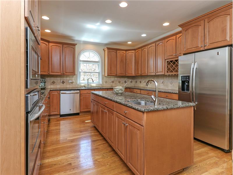 Abundant cabinetry and extensive counter space