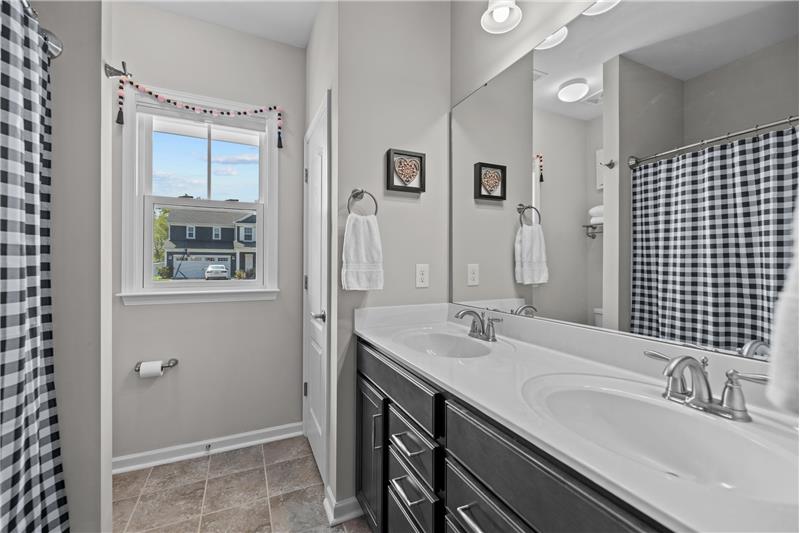 Full bathroom shared by the secondary bedrooms