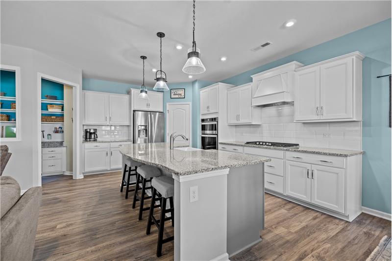 Generous storage and counter space in kitchen