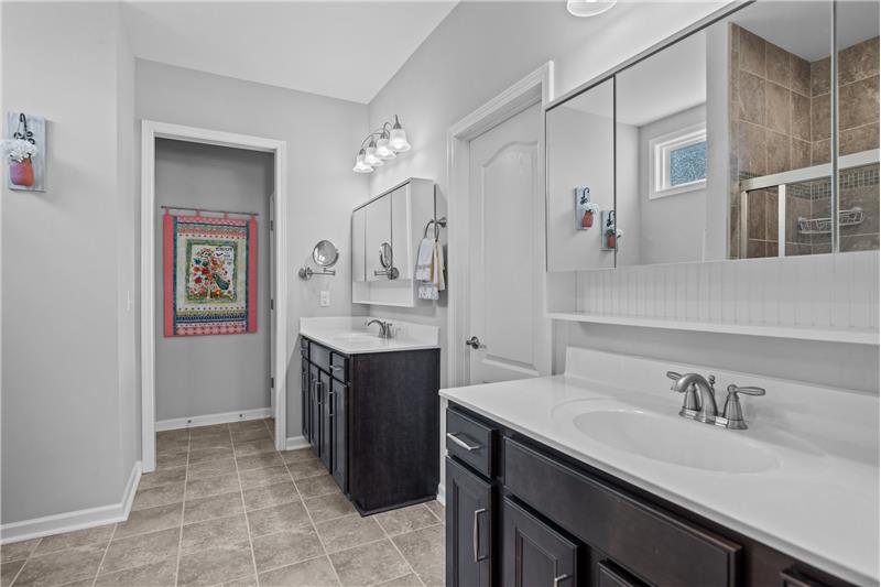 En-suite owner's bathroom with dual vanities