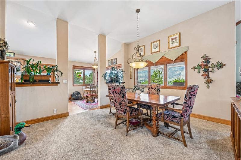 Dining room open to great room and kitchen