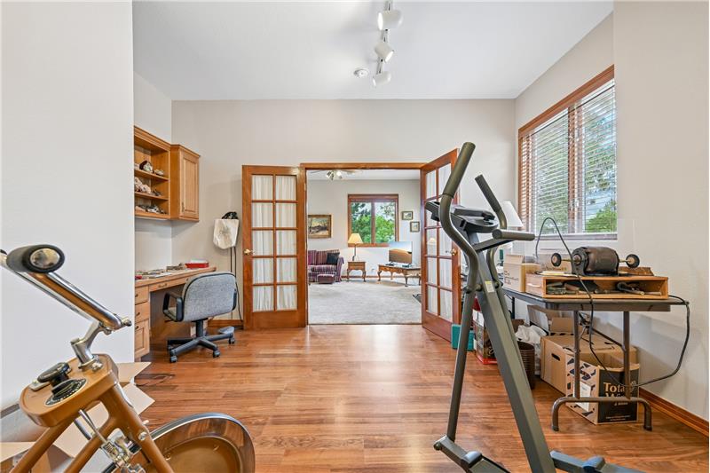 Bonus room showing French doors from family room