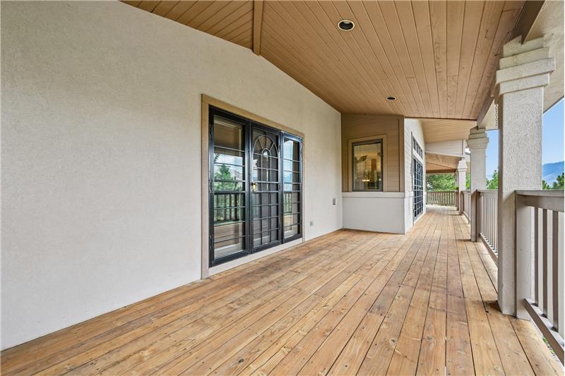 Covered deck showing door from primary suite