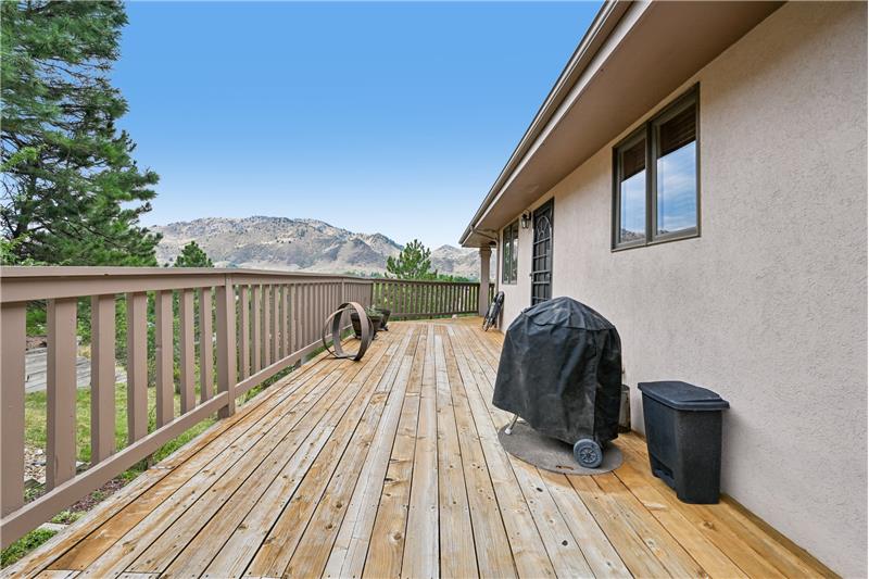 Deck outside kitchen suitable for grilling or enjoying winter sun
