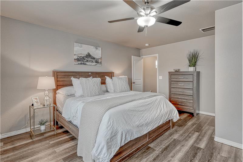 Primary bedroom with ceiling fan is accommodating and offers Mountain Views!