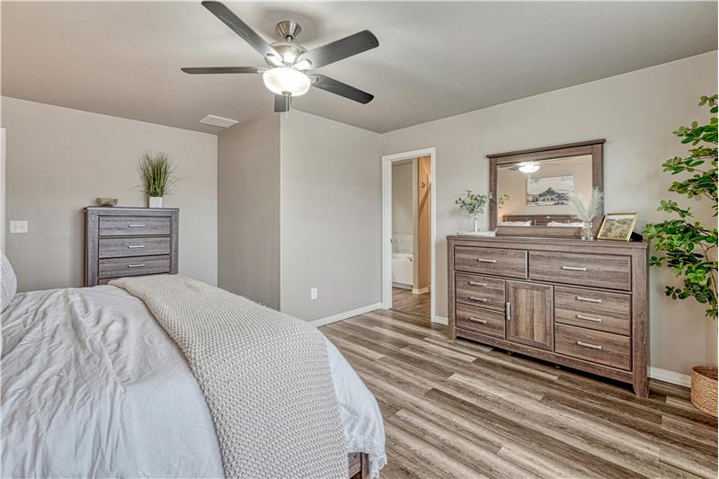 Adjoining 5-piece bathroom with walk-in closet