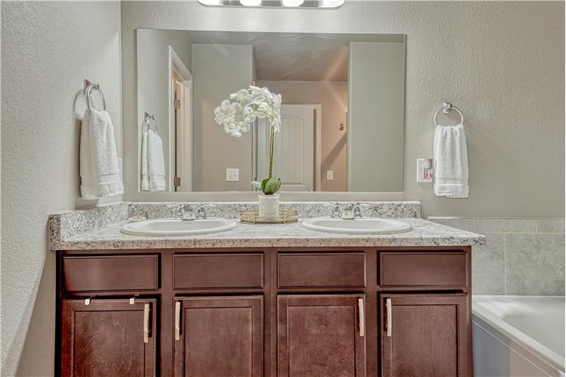 Double sink vanity with comfort height counter