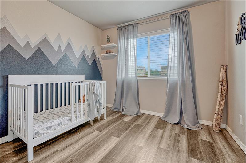 Secondary bedroom with updated flooring