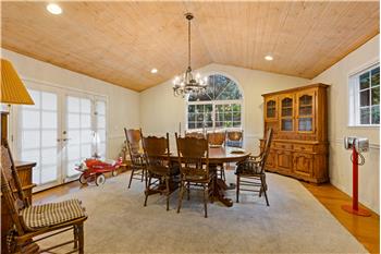 Formal Dining Room with French Doors to Brick Patio