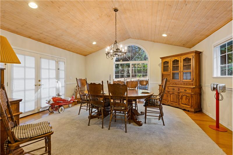 Formal Dining Room with French Doors to Brick Patio